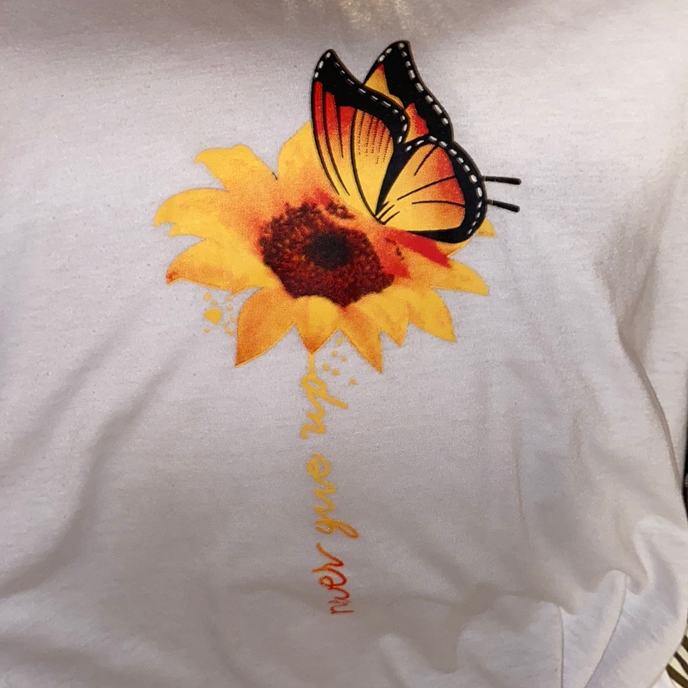 “never give up” graphic butterfly flower tee